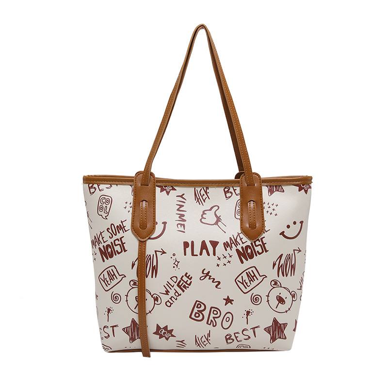The new cute cartoon printed single-shoulder bag for women in the 2024 autumn and winter season is a versatile and trendy tote bag Item Picture