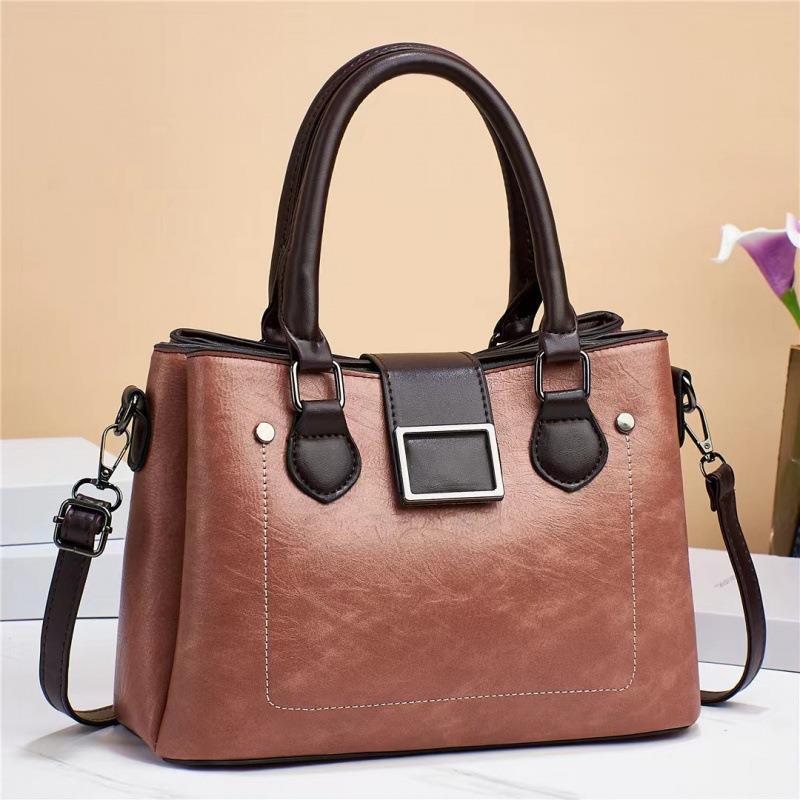 This is a new large-capacity single-shoulder crossbody women's bag for women made of retro material with contrasting colors. It has multiple layers and a high-quality texture details Picture