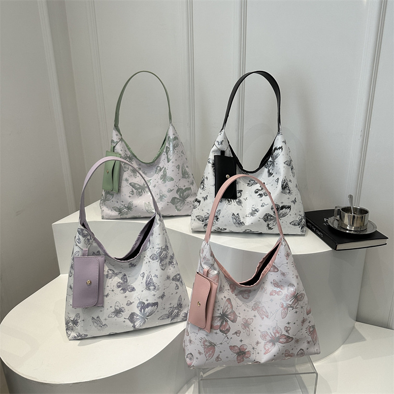 Printed butterfly large-capacity women's underarm bag 2024 Summer personalized new stylish casual commuting tote bag Application Scenario
