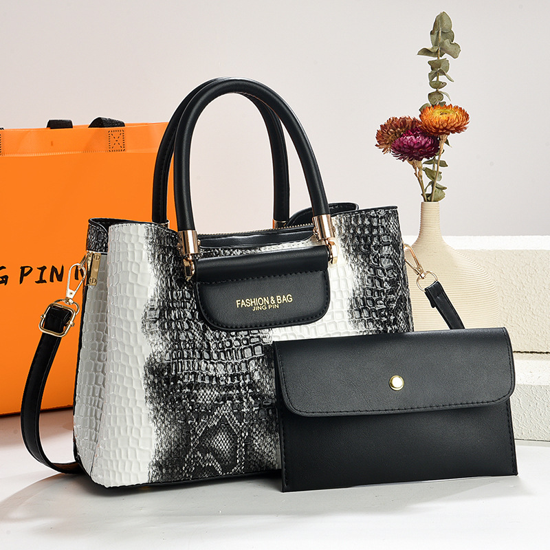 The 2025 new bright leather embossed large-capacity women's bag is fashionable and simple. It's a single-shoulder crossbody bag for middle-aged mothers with a checkered pattern details Picture
