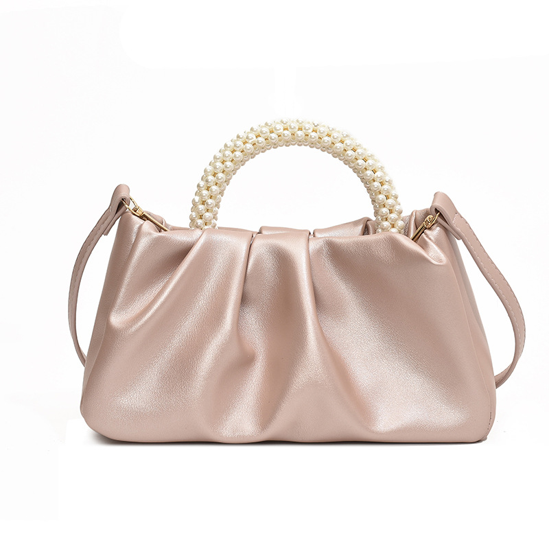 The handbag Lady 2024 Niche design Pearlescent new high-end pleated cloud bag pearl hand-held shoulder crossbody bag Item Picture