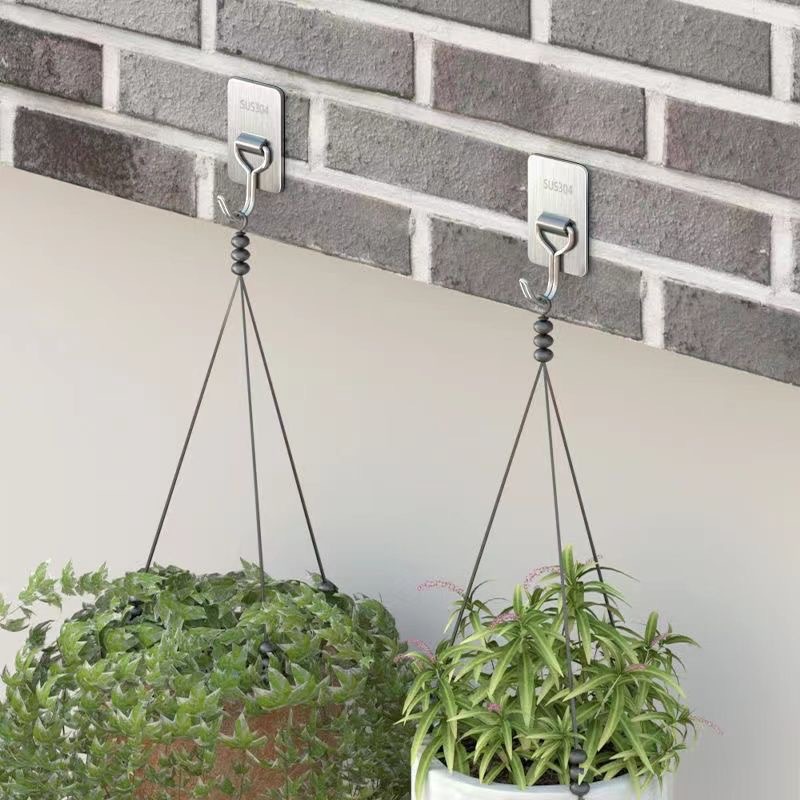 Thickened folding stainless steel hook, no need for drilling, strong and seamless wall load-bearing adhesive hook, kitchen and bathroom storage hook Application Scenario