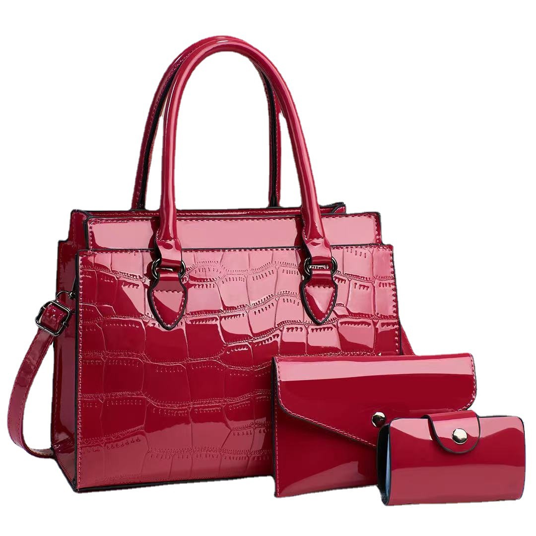 This is a stylish and elegant handbag for women, featuring a 2023 new style of shiny leather three-piece set. It is a spacious and large-capacity single-shoulder crossbody bag Item Picture