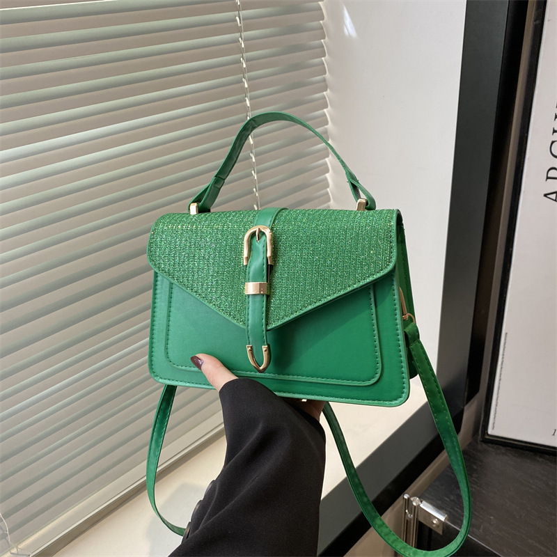 A high-end and niche handbag for women, a new style of fashionable and high-quality hand-shoulder commuter bag and crossbody bag in 2025 full figure