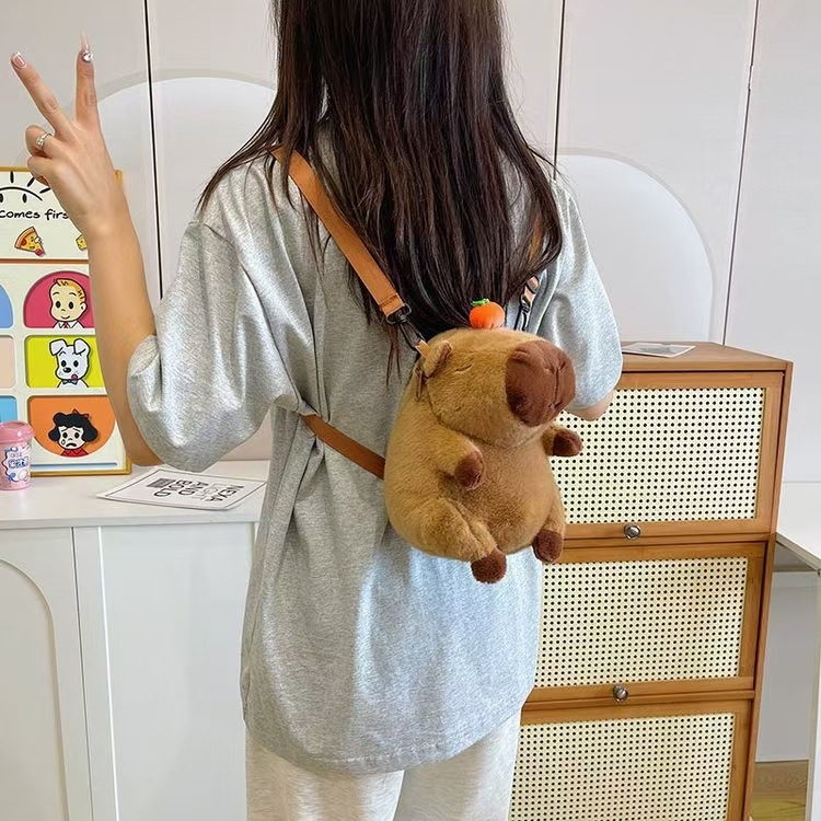 Capibara cute orange Capybara bag children's doll, double-shoulder crossbody backpack as a gift, claw machine doll details Picture