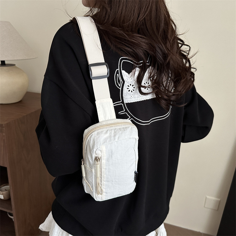 A new cross-border fashionable small backpack for women, a mini, lightweight and simple crossbody bag for sports and running, and a single-shoulder mobile phone bag details Picture