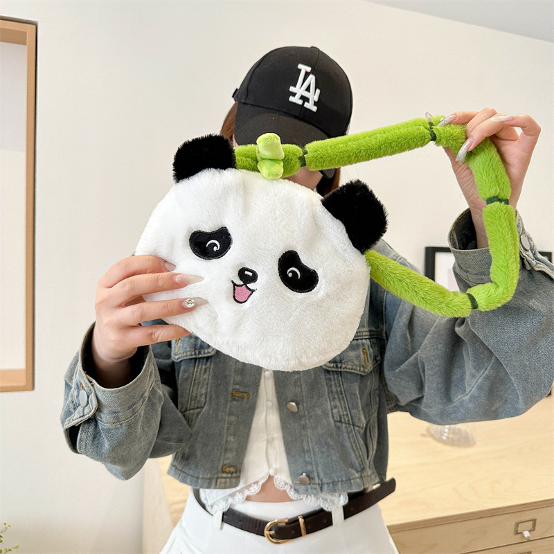 New cartoon panda plush hand-held crossbody bag, claw machine doll, panda doll, children's versatile crossbody bag wholesale Application Scenario