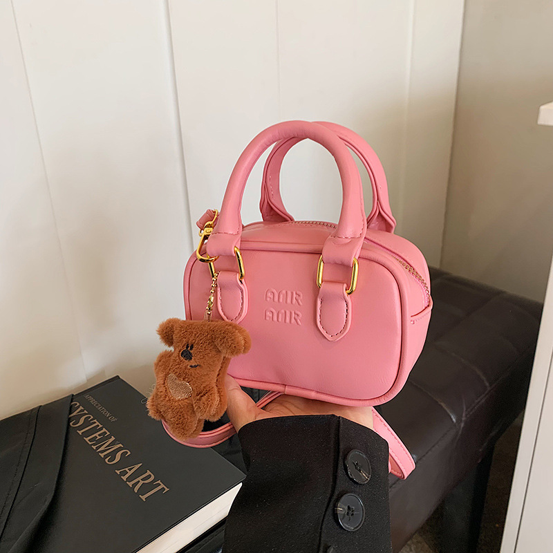 New mini hand-held bowling bag for early spring, a high-quality crossbody bag with a red envelope opening for women full figure