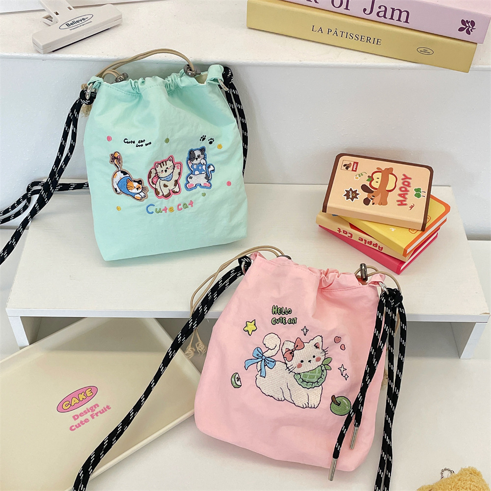 5731 Cute colorful embroidered bucket Bag, Japanese and Korean small cloth bag, casual single-shoulder crossbody mobile phone bag for academy girls Application Scenario