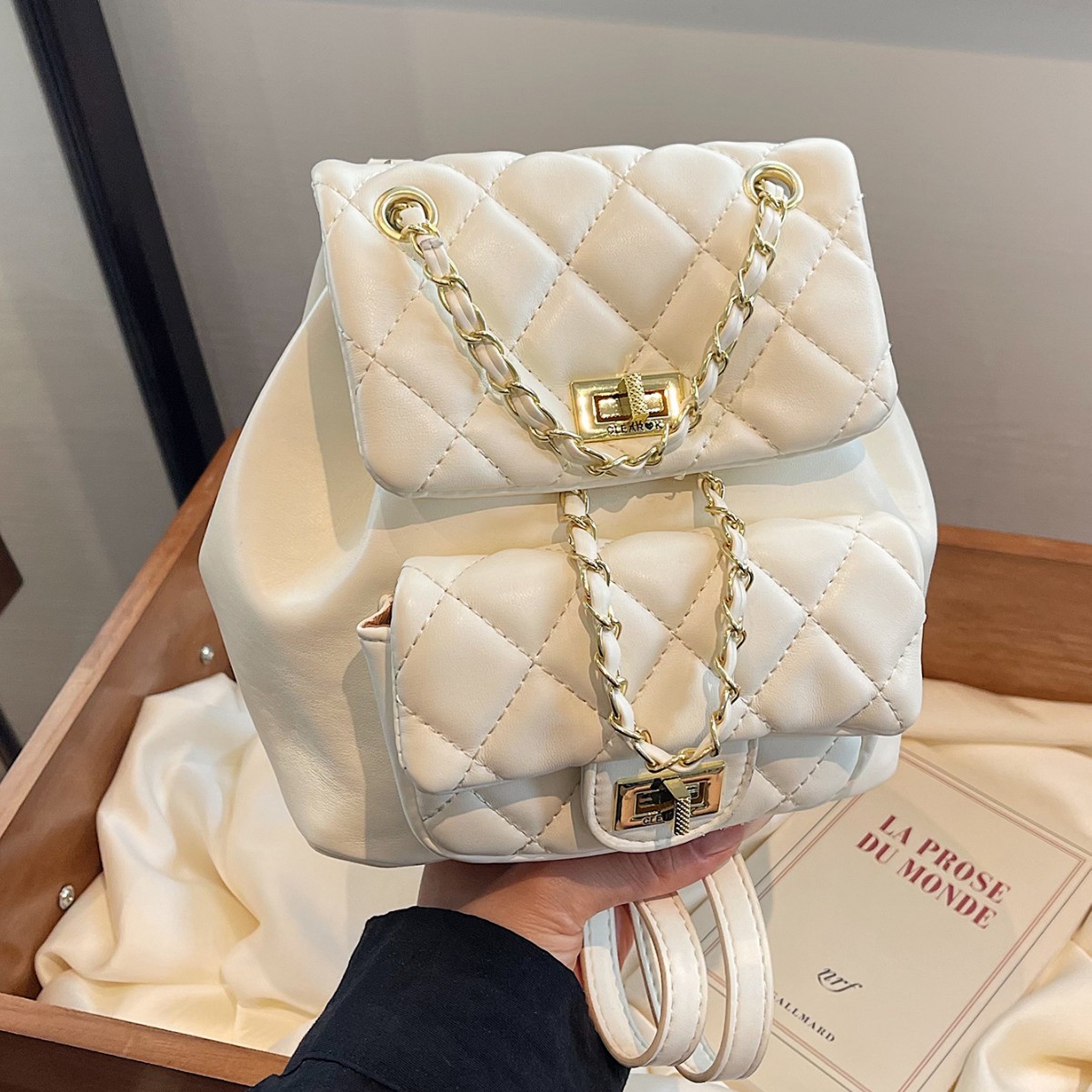 The 2025 new Korean-style chanel-style backpack for women is a trendy schoolbag for college students and a single-shoulder commuting backpack full figure