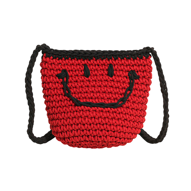 2025 New style simple bucket bag, niche women's bag, smiling knitted bag, single-shoulder bag for going out, and crossbody bag for seaside travel Item Picture