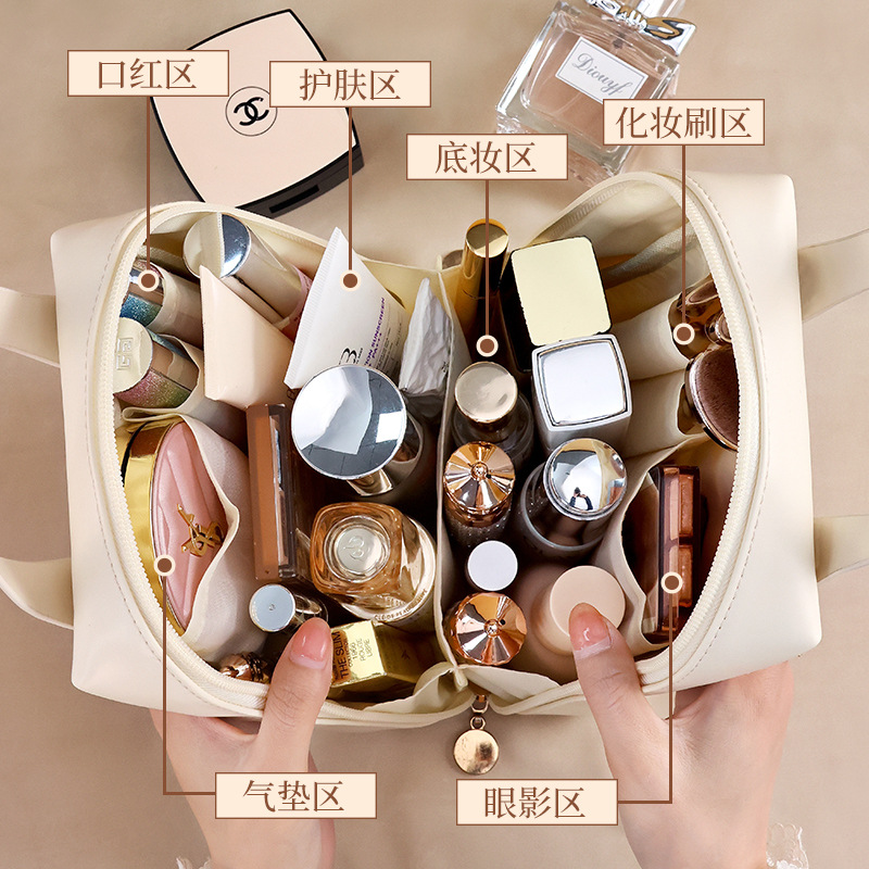 High-appearance-level shell hand-held makeup bag, portable large-capacity storage bag, cosmetics storage bag, travel toiletries bag details Picture