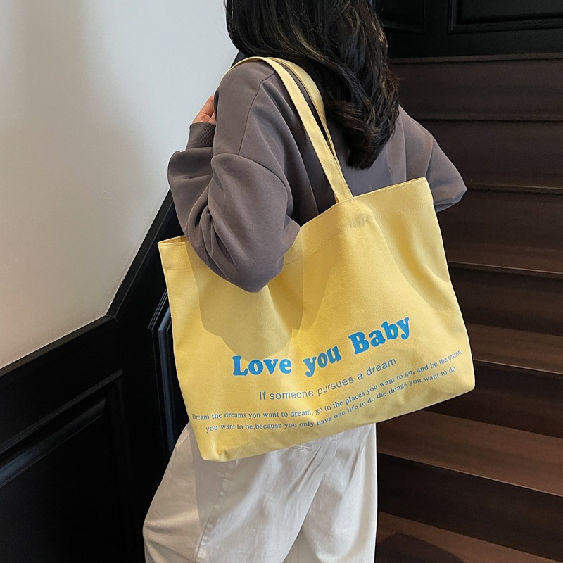 2025 New student class large-capacity commuter tote bag, women's letter fashionable solid color casual underarm single-shoulder bag details Picture