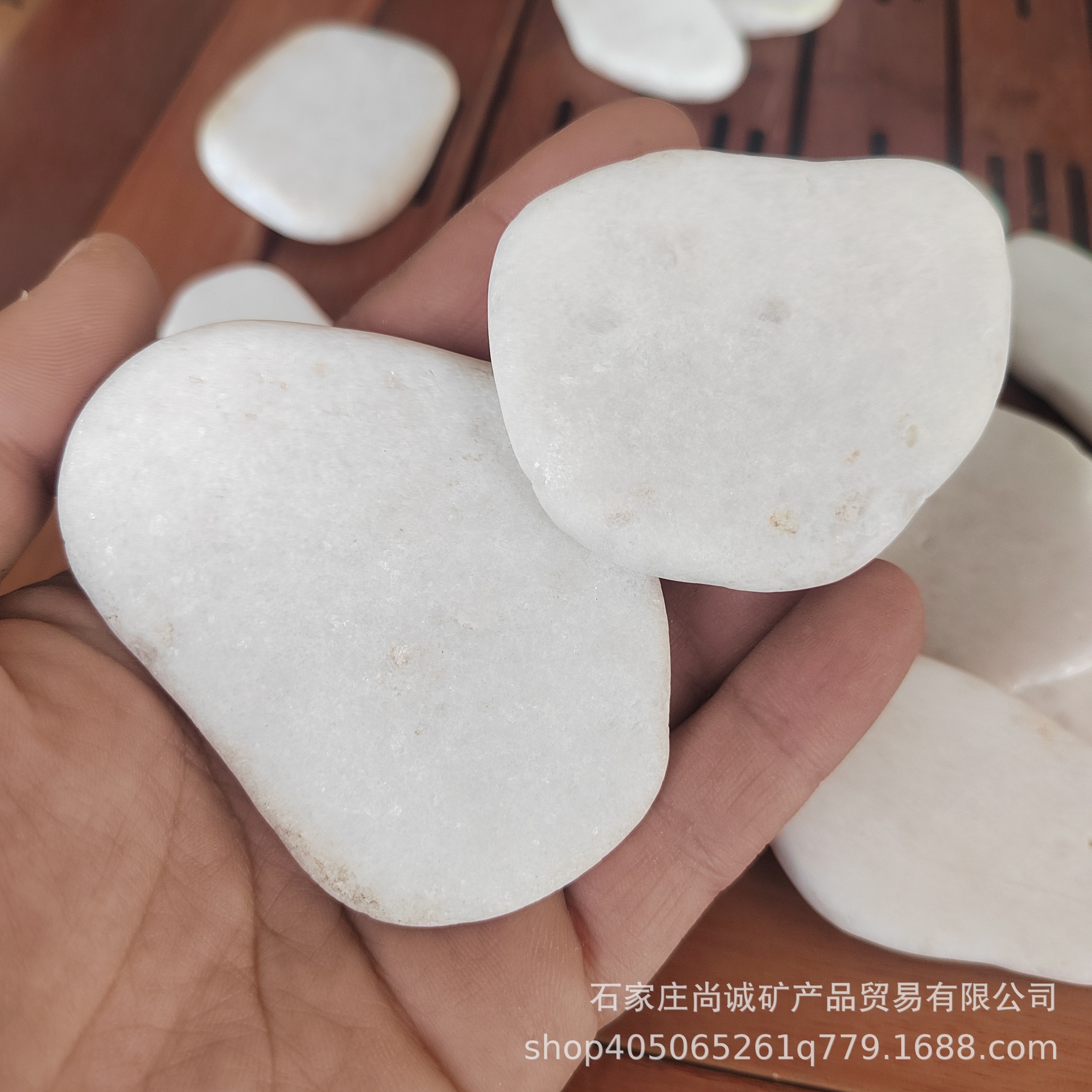 White painted flat stones, white painted pebbles, white painted stones, painted stones, colored painted stones details Picture