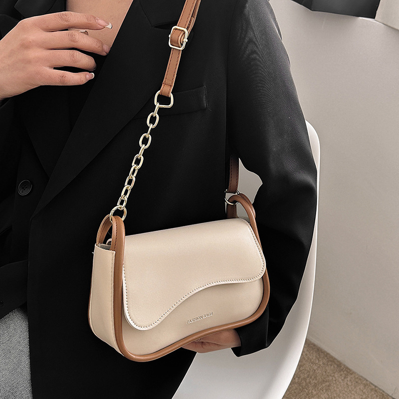 The fresh and artistic color-blocking small square women's bag is a niche 2023 spring fashion single-shoulder crossbody bag with a versatile feel for ladies details Picture