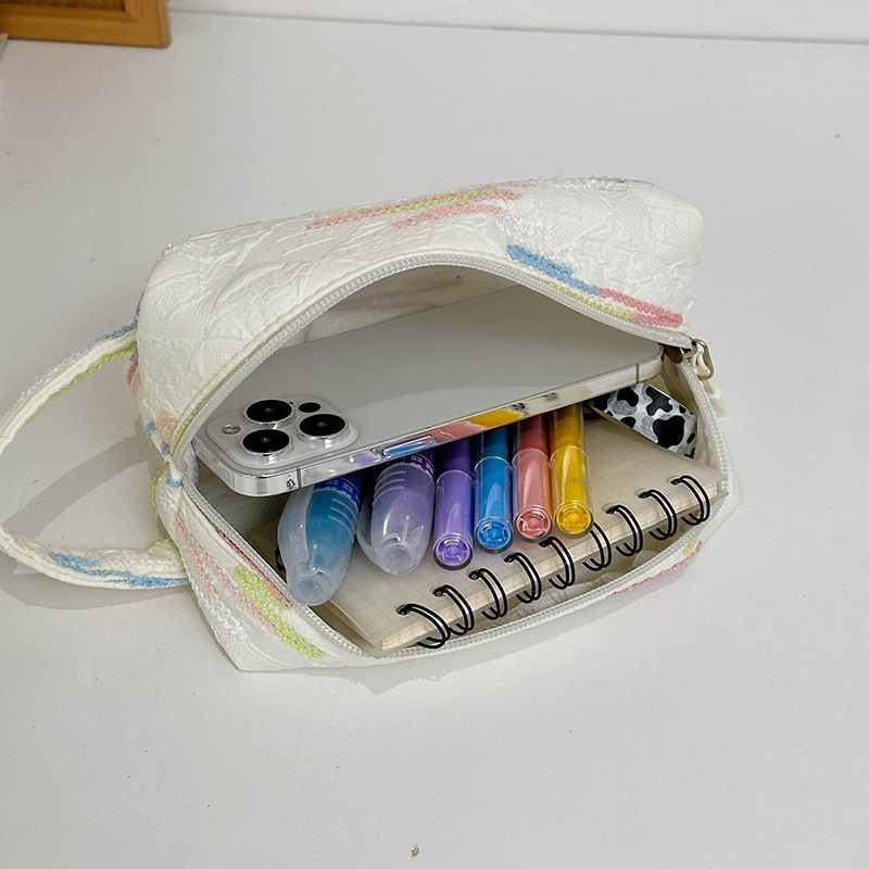 2024 New Chanel-style woolen embroidery down fabric octagonal bag for women, hand-held makeup bag, large-capacity loose change bag Application Scenario