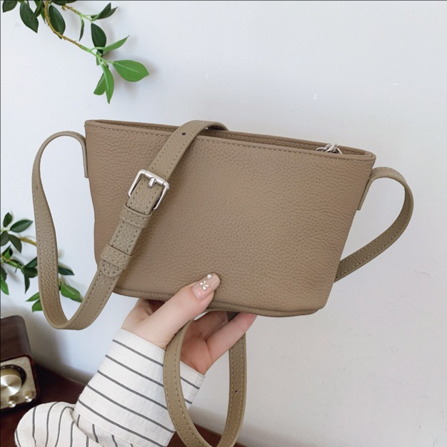 Cross-border niche design lychee pattern bucket bag for women 2025 new fashion trend solid color single-shoulder crossbody bag full figure