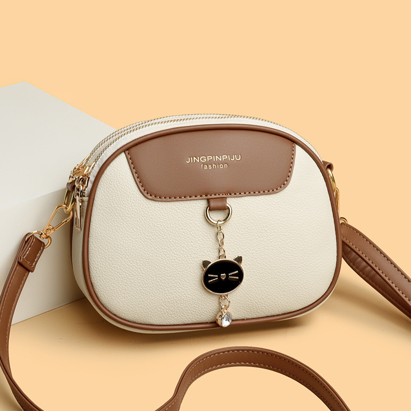 The new 2025 trendy and fashionable small round bag for women, versatile single-shoulder crossbody bag, soft leather for women, mobile phone bag and women's bag full figure