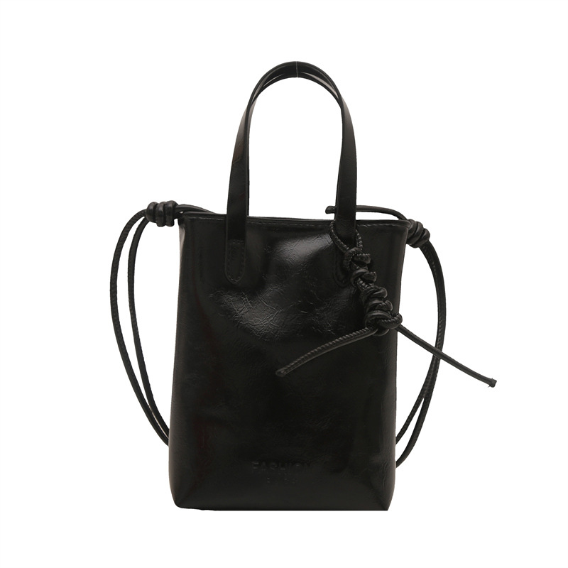 High-end and niche design women's 2025 new versatile hand-held small square bag, a small bag for holding mobile phones in summer Item Picture