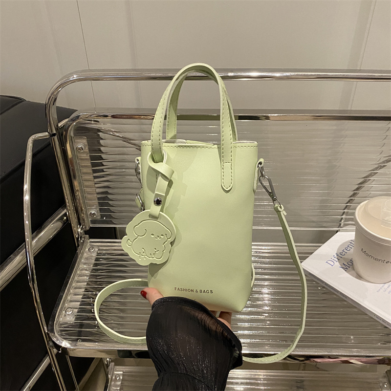 Lychee-patterned mobile phone bag for women 2025 new spring and summer versatile, lightweight mini crossbody bag, solid color hand-held bucket bag full figure