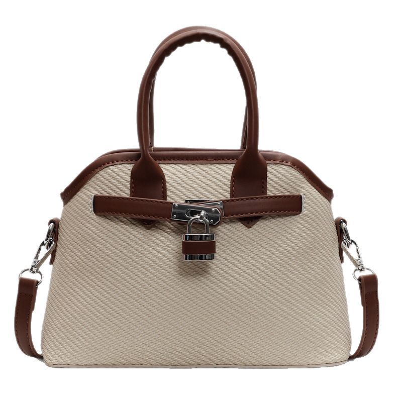 Cross-border niche and versatile casual hand-held bucket bag for women 2025 new retro and simple striped single-shoulder crossbody bag Item Picture