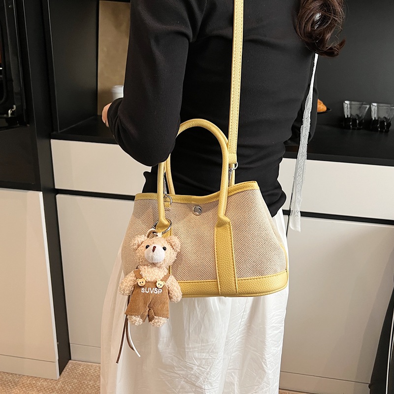 2025 New color-blocking canvas handbag, women's large-capacity commuter single-shoulder tote bag, casual and versatile crossbody bag details Picture