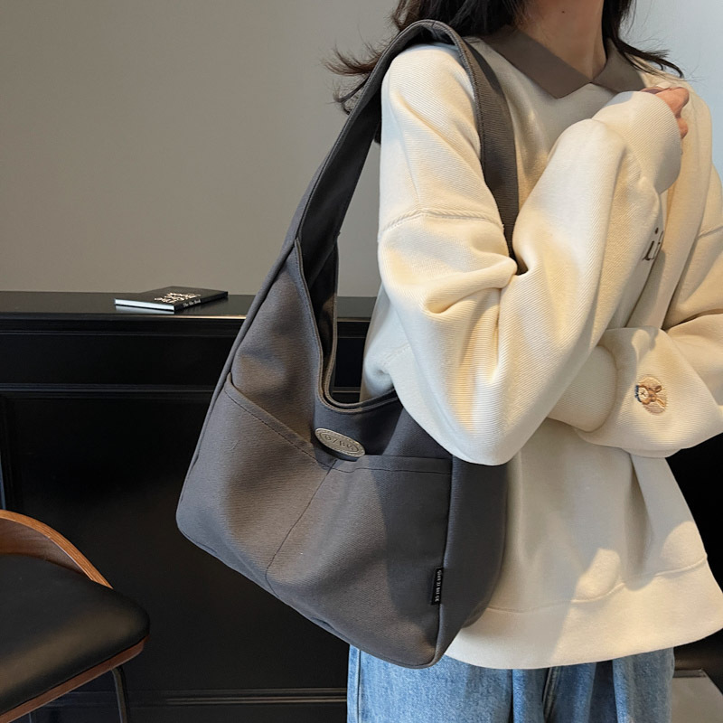 New large-capacity simple canvas bags, single-shoulder underarm bags for students' classes, niche fashion and versatile tote bags wholesale details Picture
