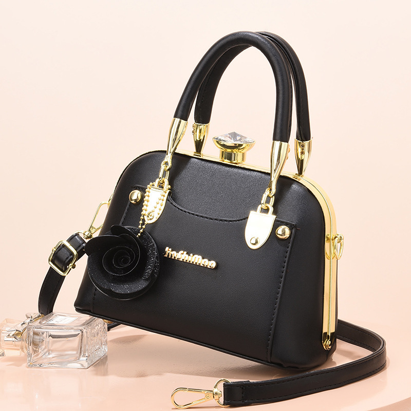 Steel frame shell mini bag 2024 Women's Bag Trend single-shoulder bag Cross-border trend Single-shoulder bag manufacturer direct sales and consignment full figure