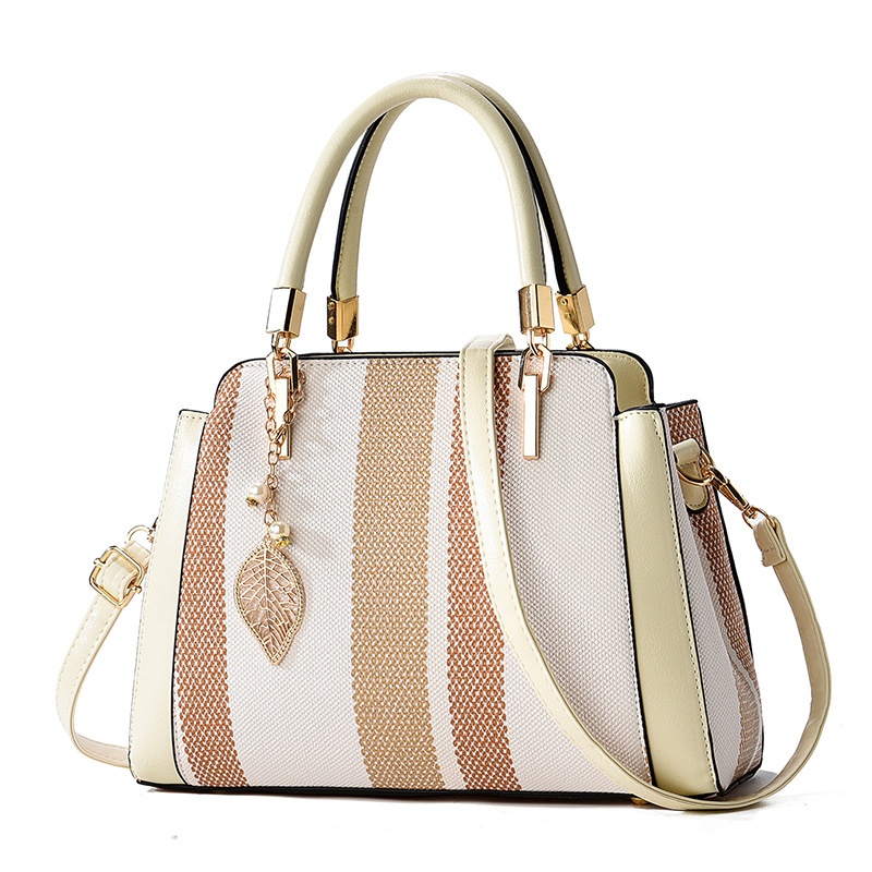 The new spring collection from the manufacturer is a versatile striped crossbody bag for women in foreign trade. It is a popular large handbag for women in 2024 Item Picture
