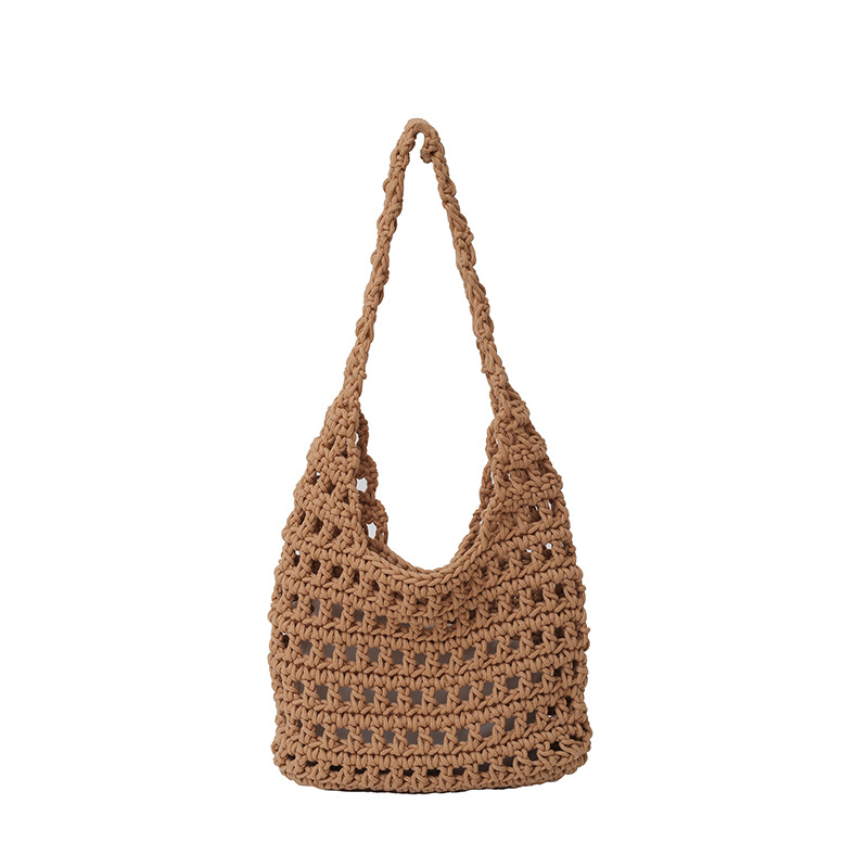 A large-capacity commuting woven bag for women, a new retro hollowed-out knitted bag with a relaxed grid beach bag Item Picture