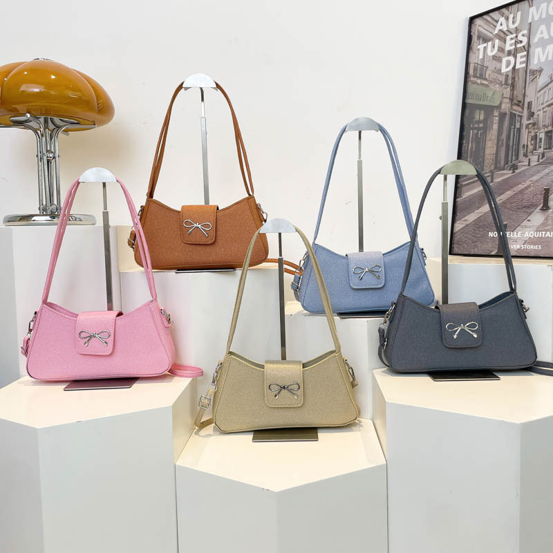 2025 New Korean-style, niche, high-end, versatile commuter baguette bag, minimalist bow, single-shoulder, underarm bag for women Application Scenario
