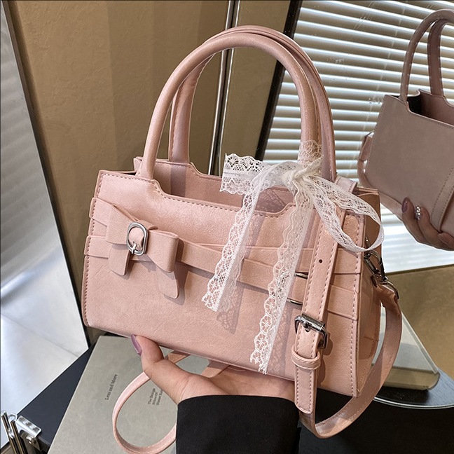 A new Korean version of a niche bag for women in 2025, featuring a stylish bow single-shoulder underarm bag and a casual, simple crossbody small square bag full figure