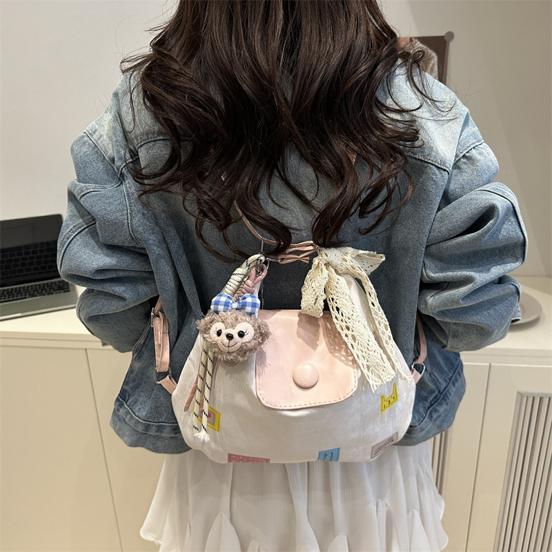 Fashionable, sweet and cute tote bag for women, large-capacity Korean version color-blocking hand-held shoulder bag, multi-functional student backpack details Picture