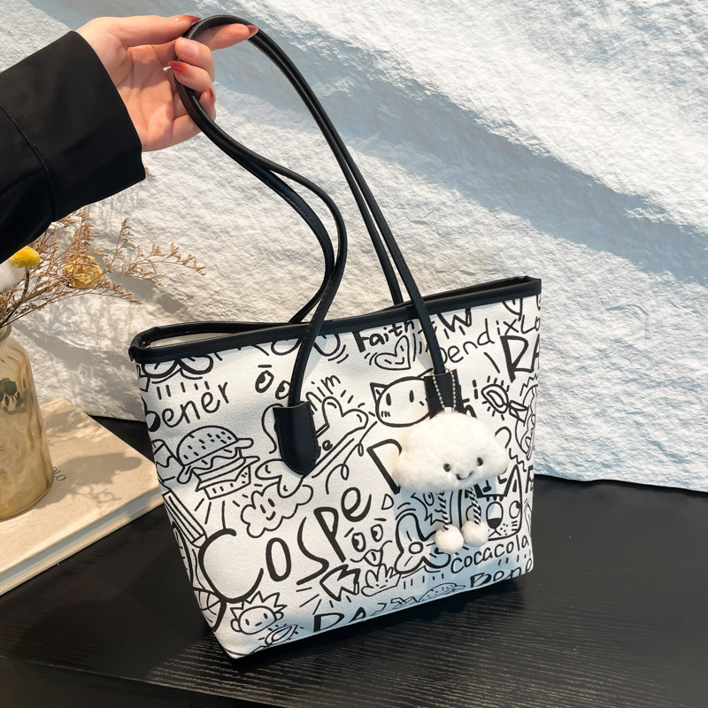 Graffiti canvas bag for women, 2024 new style casual single-shoulder bag, versatile, large-capacity student commuting tote bag full figure