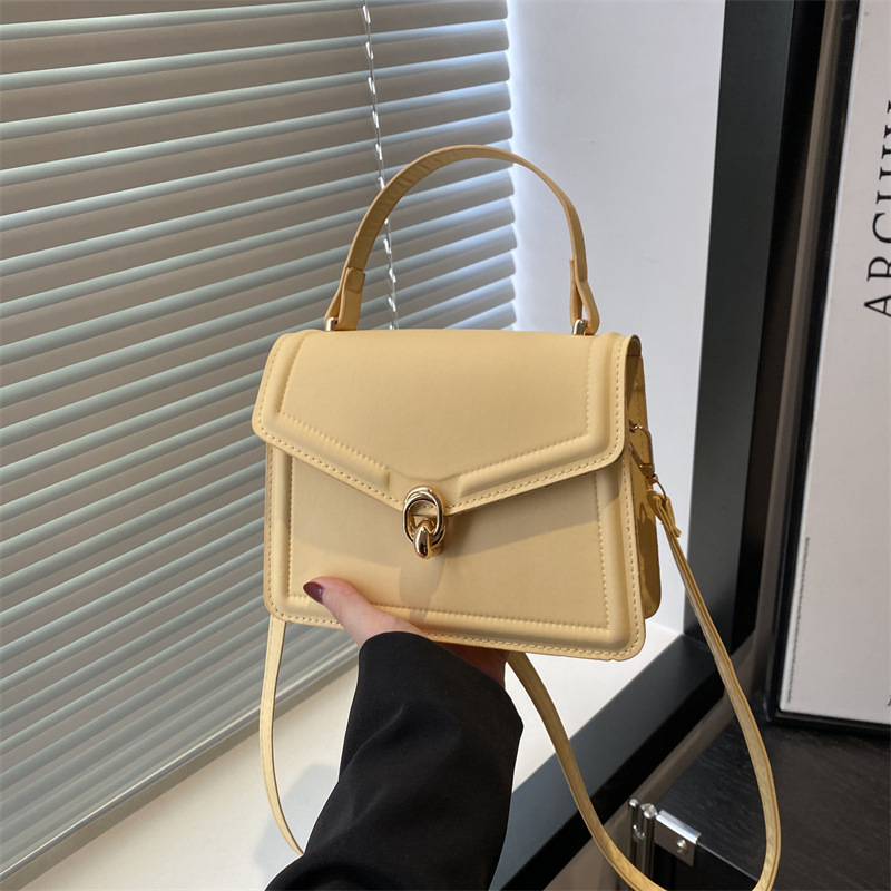 A new solid-color ladies' fresh, large-capacity, summer-quality, single-shoulder, crossbody and hand-carry small square bag from 2025 full figure