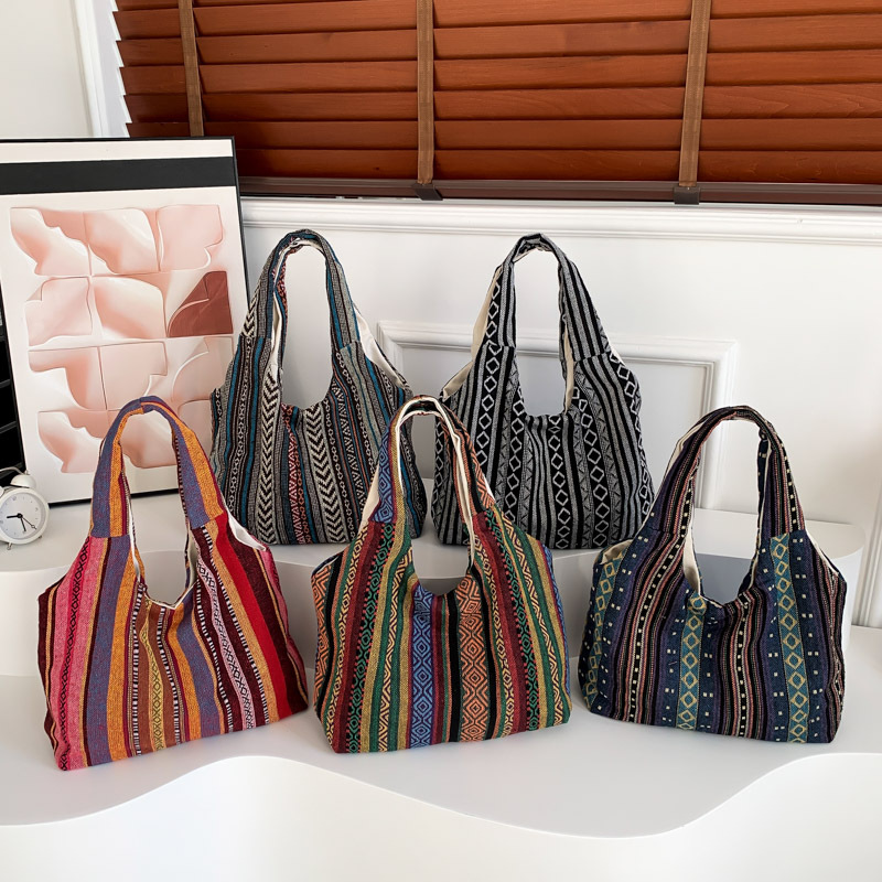 The 2024 new ethnic-style striped single-shoulder bag is fashionable, simple and has a large capacity slanted bucket full figure