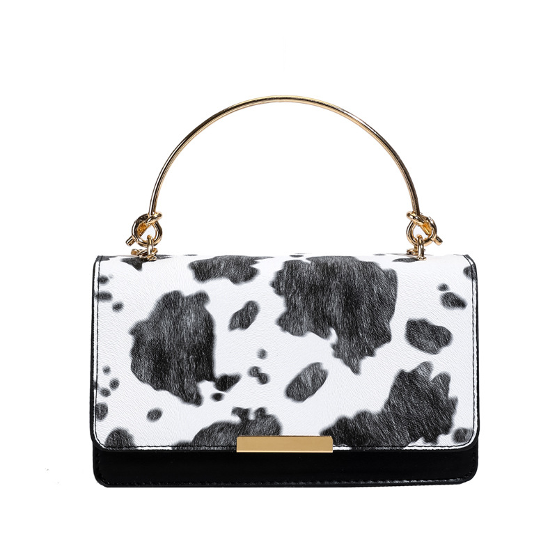 This is a retro and fashionable cow print handbag from Europe and America. It is a new style for women's summer 2025, featuring a high-quality commuting single-shoulder crossbody bag Item Picture