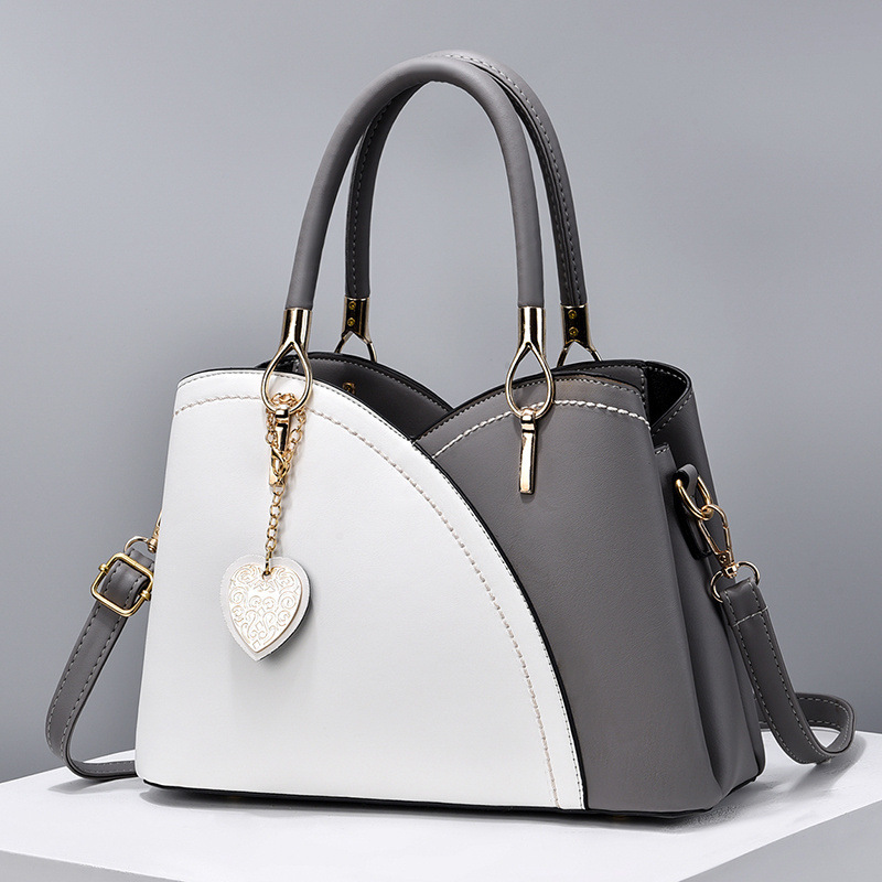The 2022 new color-blocked fashionable commuter women's bag, a trendy single-shoulder, crossbody, hand-held tote large bag for cross-border trade Specification drawing