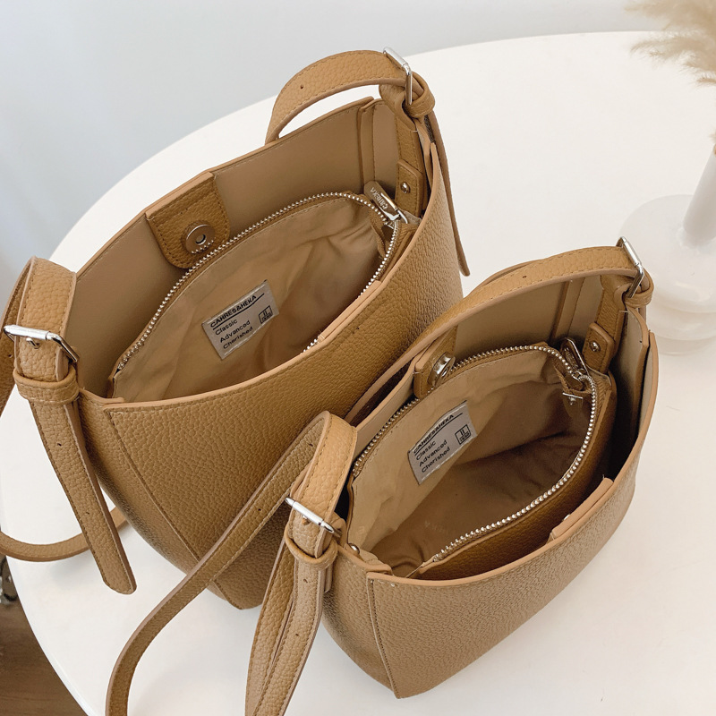 Korean niche design simple single-shoulder bag for women, new fashion bucket bag for summer 2025, versatile solid color crossbody bag Application Scenario