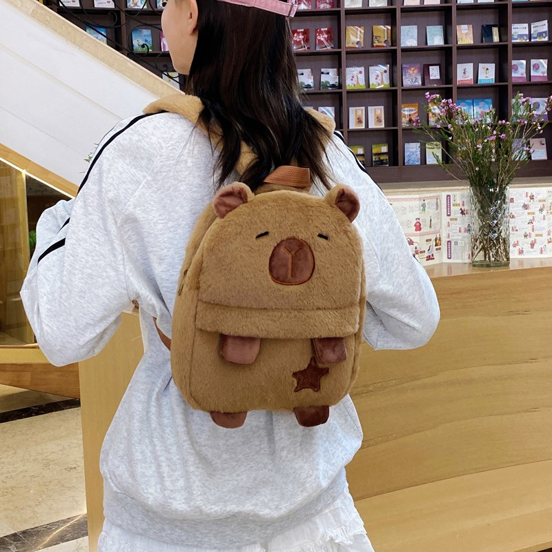 The new Capibara plush Capybara backpack is cute and versatile. It features a plush bag for girls and cartoon students, as well as a small cross-border backpack Specification drawing