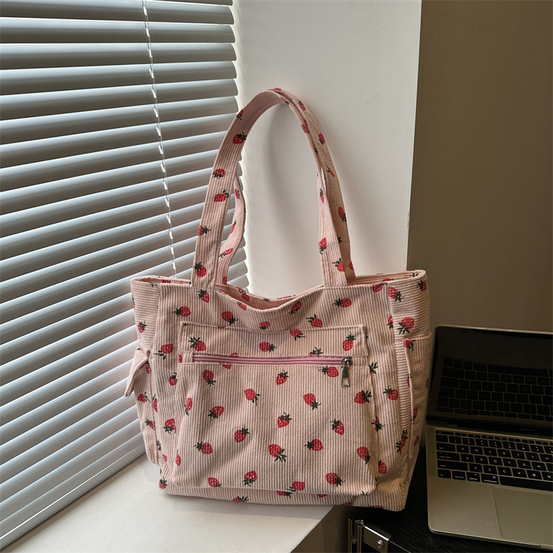 The versatile new strawberry corduroy 2024 Tote bag, single-shoulder bag, casual large-capacity, laid-back style storage shopping bag full figure