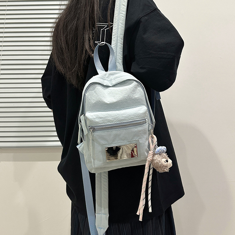 Nylon fabric large-capacity backpack 2025 new multi-functional student class solid color casual travel backpack details Picture