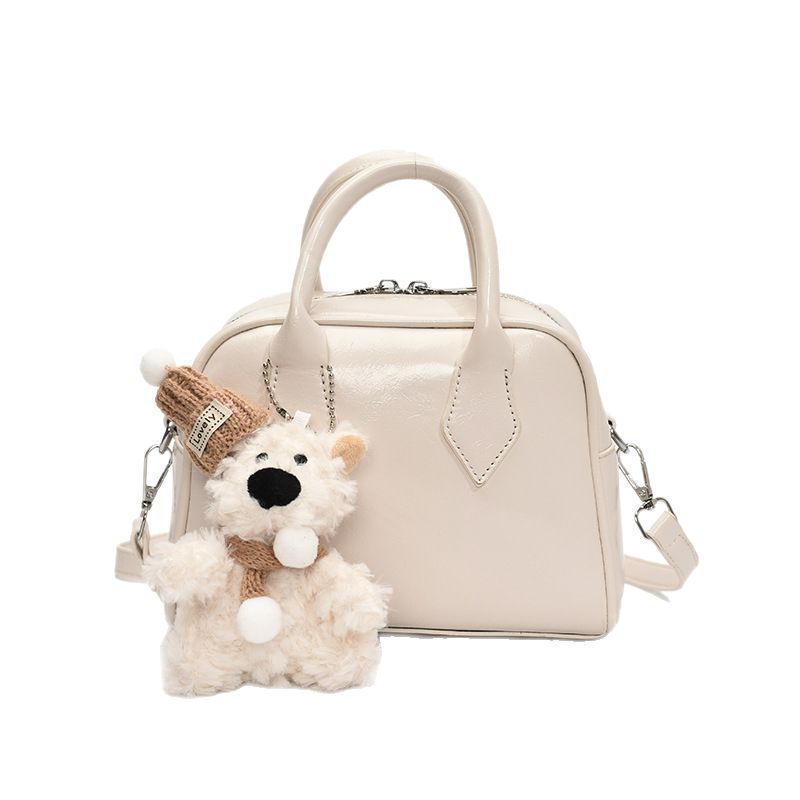 Soft leather fashionable hand-held bowling bag for women 2025 new style casual and versatile crossbody bag for work and commuting pillow bag Item Picture