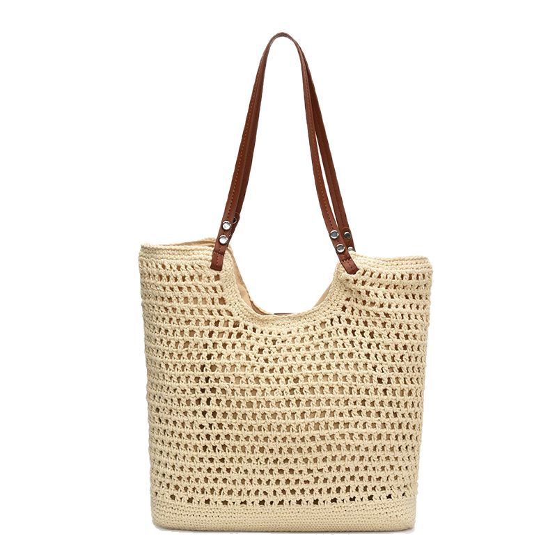 Hollowed-out knitted large-capacity bucket bag for women, 2025 new style, versatile for seaside vacation, beach and commuting, single-shoulder bag Item Picture