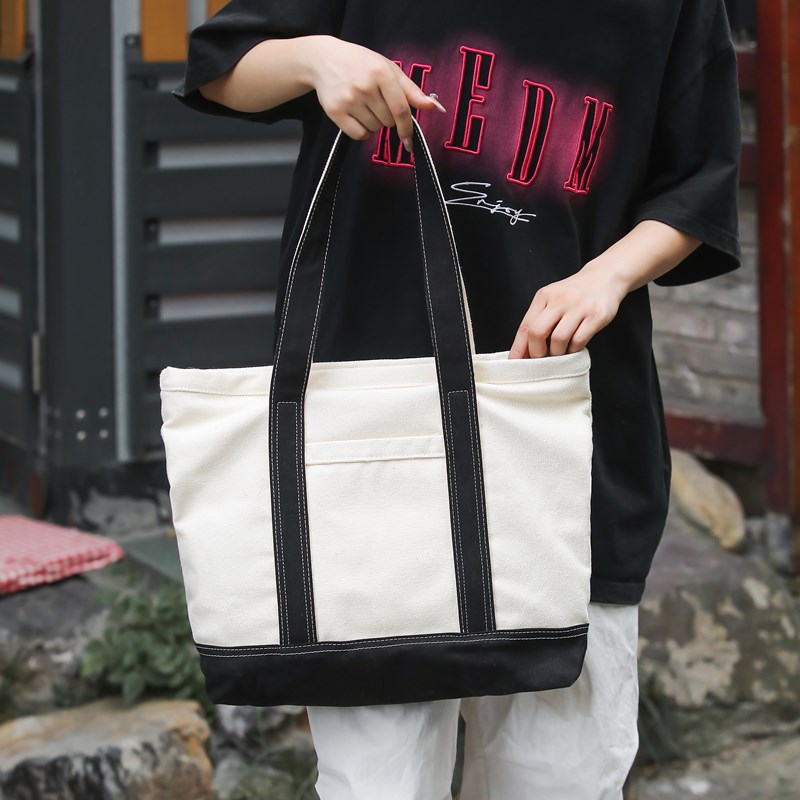 A new trendy and versatile canvas bag for women, a casual tote bag for work and commuting details Picture