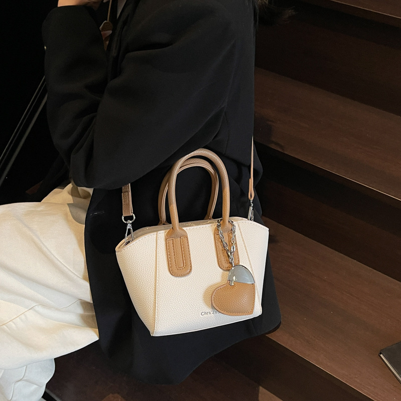 2025 New niche design solid color single-shoulder crossbody bag for women, high-end commuting, lychee pattern hand-held bucket bag for women Specification drawing