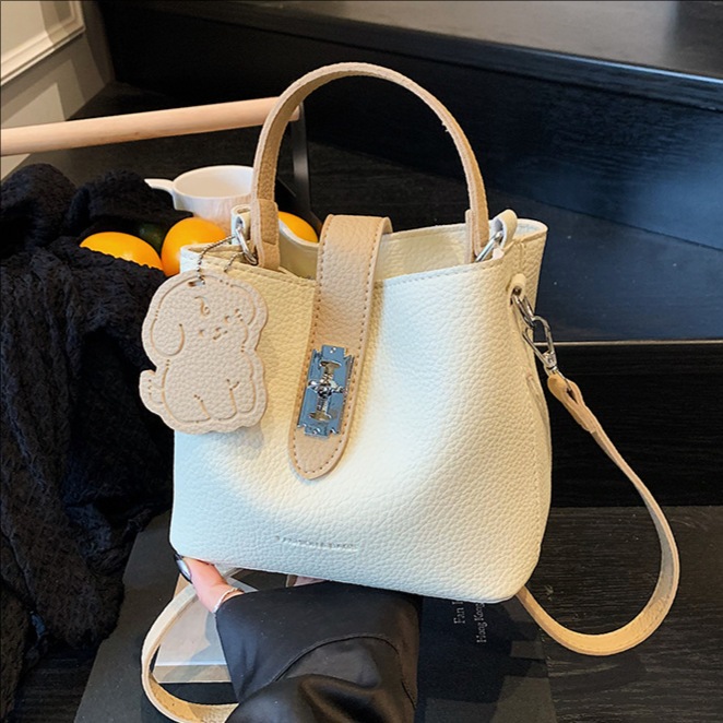 Cross-border lychee pattern trendy hand-held bucket bag for women 2025 new style, fashionable, versatile, casual and niche single-shoulder crossbody bag full figure