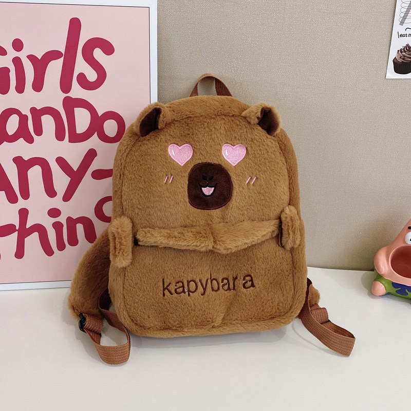 The 2025 new Capibara plush Capybara backpack is cute and versatile. It features a plush bag and a cartoon student mini backpack for girls Specification drawing
