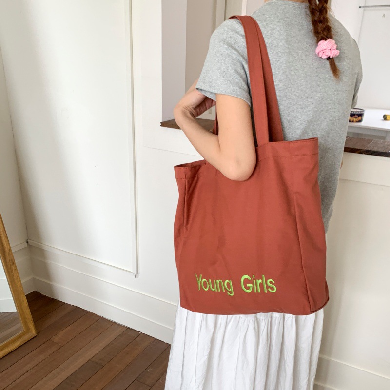 2025 New trendy lettered canvas bag for women with a laid-back style, large-capacity bucket bag, casual and versatile, fashionable single-shoulder bag Specification drawing