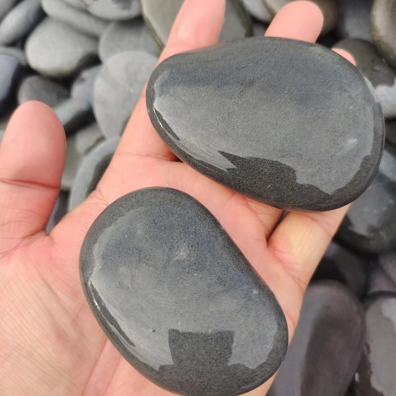 Black painting stones are available in a full range of specifications. Children can DIY hand-painted stones, flake pebbles, and children's hand-painted stones Specification drawing